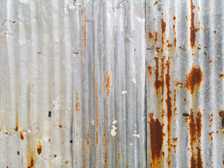 Rusty corrugated metal wall for background