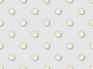 cosmetic cream in containers on grey background, seamless background pattern