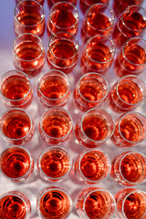 Blured background from wedding glasses filled with champagne