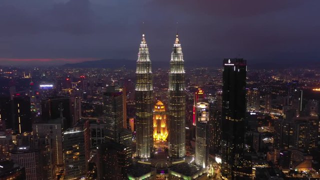 night illumination kuala lumpur downtown famous towers aerial panorama timelapse 4k malaysia