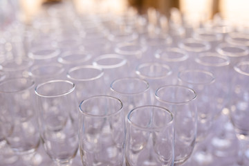 Blured background from wedding glasses filled with champagne