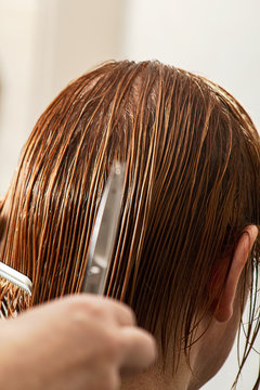 Hairdresser prepair hair for cutting