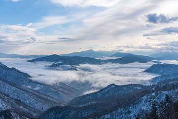 Fototapeta na wymiar Magnificent Mountain Snow Panoramic Landscape Opening From the Observation Deck Lago-Naki, The Main Caucasian Ridge, Russia