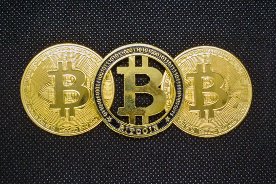  bitcoin black perforated background.