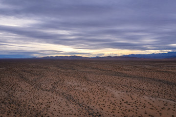 Fototapeta na wymiar Aerial view sunset over a desert near Moapa Valley in Nevada