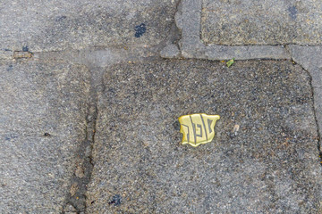 Spain in Hebrew on the street pavement, in Caceres