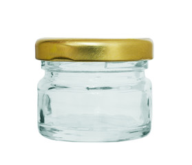 the empty glass jar closed by an iron cover on a white background