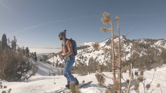 Splitboarder On Mountain Top