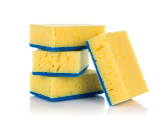 Group of yellow sponges for cleaning ware isolated on white background