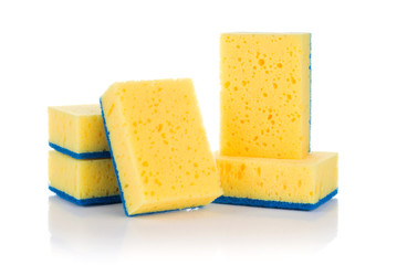 Group of yellow sponges for cleaning ware isolated on white background