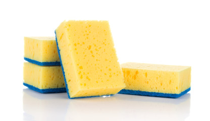 Group of yellow sponges for cleaning ware isolated on white background