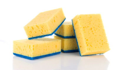 Group of yellow sponges for cleaning ware isolated on white background