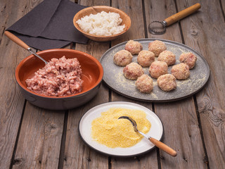 The process of cooking meatballs, ingredients for meatballs on different plates