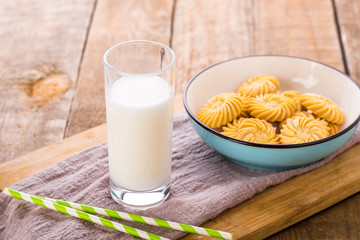 Glass of Milk with Straws and Cookies