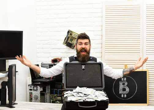 Money always get him excited. Bitcoin for business. Bearded hipster with bitcoin symbol and dollars. Bearded man with cash money. Business man in server room. From paper money to crypto currency
