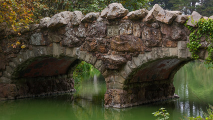 Victorian stone bridge over Stow Lake, Golden Gate Park San Francisco