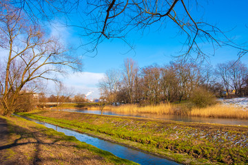 Dolina Sluzewiecka valley and public park in Warsaw, Poland along the Potok Sluzewiecki creek in early spring season. © Art Media Factory