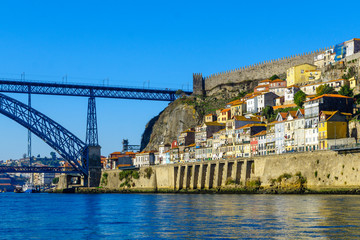 Fototapeta na wymiar Dom Luis I Bridge and the Ribeira (riverside), in Porto