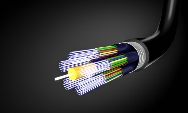  3d image of an optical fiber with several cables inside. black background. speed and telecommunication technology concept. nobody around.
