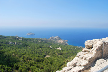 Fototapeta na wymiar View of the coast and the ruins of Monolithos Castle, Rhodes Island, Greece