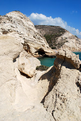 Caves in the rocky shore of the bay, Cape Fourni, Rhodes island, Greece