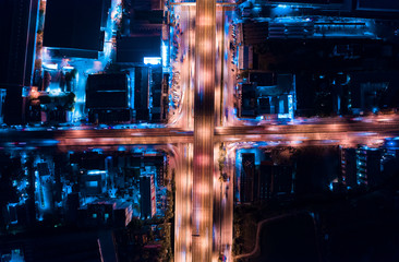 Drone Aerial View of Busy Urban Highway Road Junctions at Night. The Intersecting Freeway Road Overpass The Eastern Outer Ring Road.