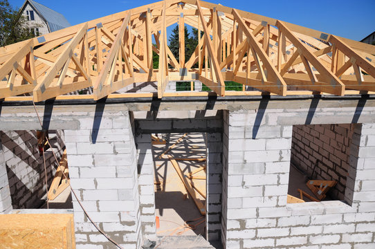 Roofing Construction House With Wooden Beams, Trusses, Timber.