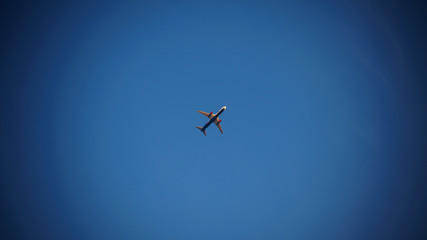 the plane is flying in the sky in the traces no clouds