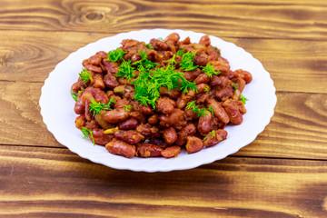 Traditional georgian kidney beans dish lobio on wooden table
