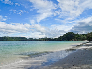 Fototapeta na wymiar Beautiful coast with azure sea and white sand, Blue sky with cirrus clouds, Thailand.