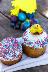 Decorated home made Easter cake . painted colorful chicken eggs for spring Christian Orthodox holiday celebration.