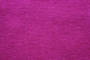 Purple fabric canvas texture background, vivid velvet pink color backdrop. Textured seamless purple cloth material, bright surface of fashion clothes textile, blank wallpaper with copy space