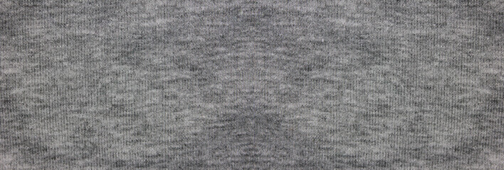 Fototapeta na wymiar Gray fabric texture background of faded grey colored sweater. Cloth surface & material design for empty backdrop, modern fashion clothes pattern. Blank wide canvas and copy space template