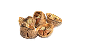 Group of broken walnuts, isolated on white background