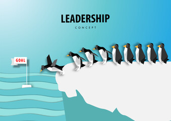 Leadership concept with leader of penguins standing on ice ,origami or paper art design vector © titaporn
