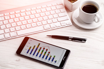 Items for business on a light background on the table, view from the top