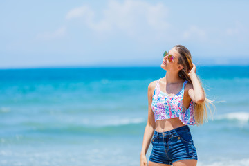 Girl having fun on the tropical beach