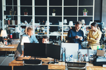 Office teamwork situation. Group of people and daily general tasks in the big workplace