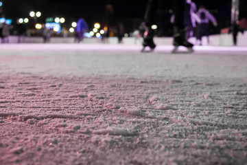 ice rink with blurred ice skates
