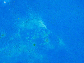 Blue cracked wall's surface