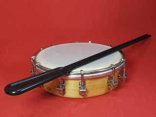 Tamborim and drumstick: a Brazilian percussion musical instrument. It is used to play samba, the...