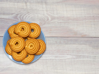 Fototapeta na wymiar Cookies on a wood background