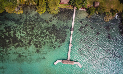 Drone photo of wooden pier dock in the Mexican Lagoon 