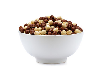 Isolated bowl of chocolate corn brown and white balls on a white background for healthy cereal dry...