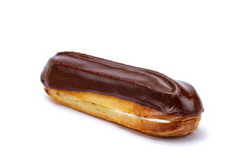 Traditional french dessert. Isolated eclair with custard and chocolate icing on white background....