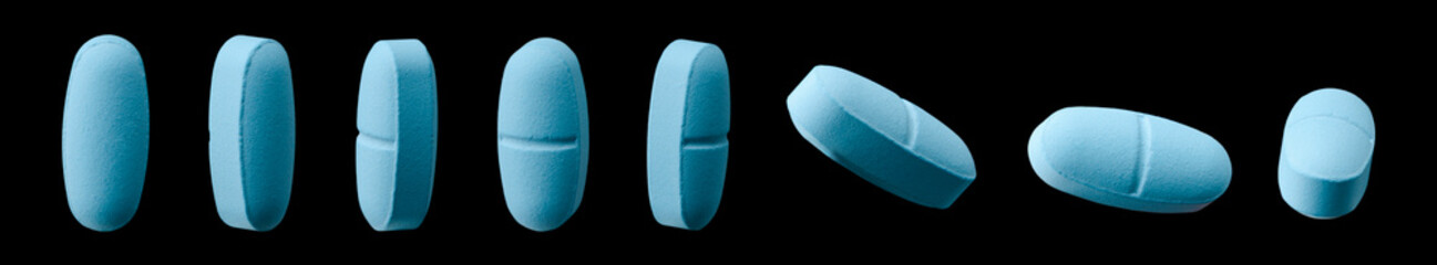 Blue caplet pill on black
