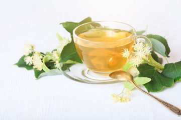 Linden tea in a glass cup.