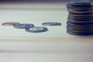 coins on the table .