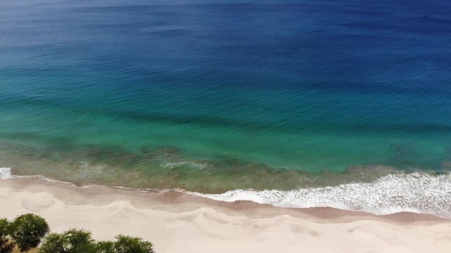 Sea beach line above droen view on sunny day
