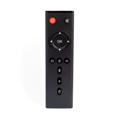 Fototapeta premium A black modern TV Media Player remote control isolated on white background. Top view. This has clipping path.